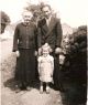 Kate MCINERNEY (nee COLLINS) with son Michael MCINERNEY and his daughter Maureen in Old Pallas about 1950